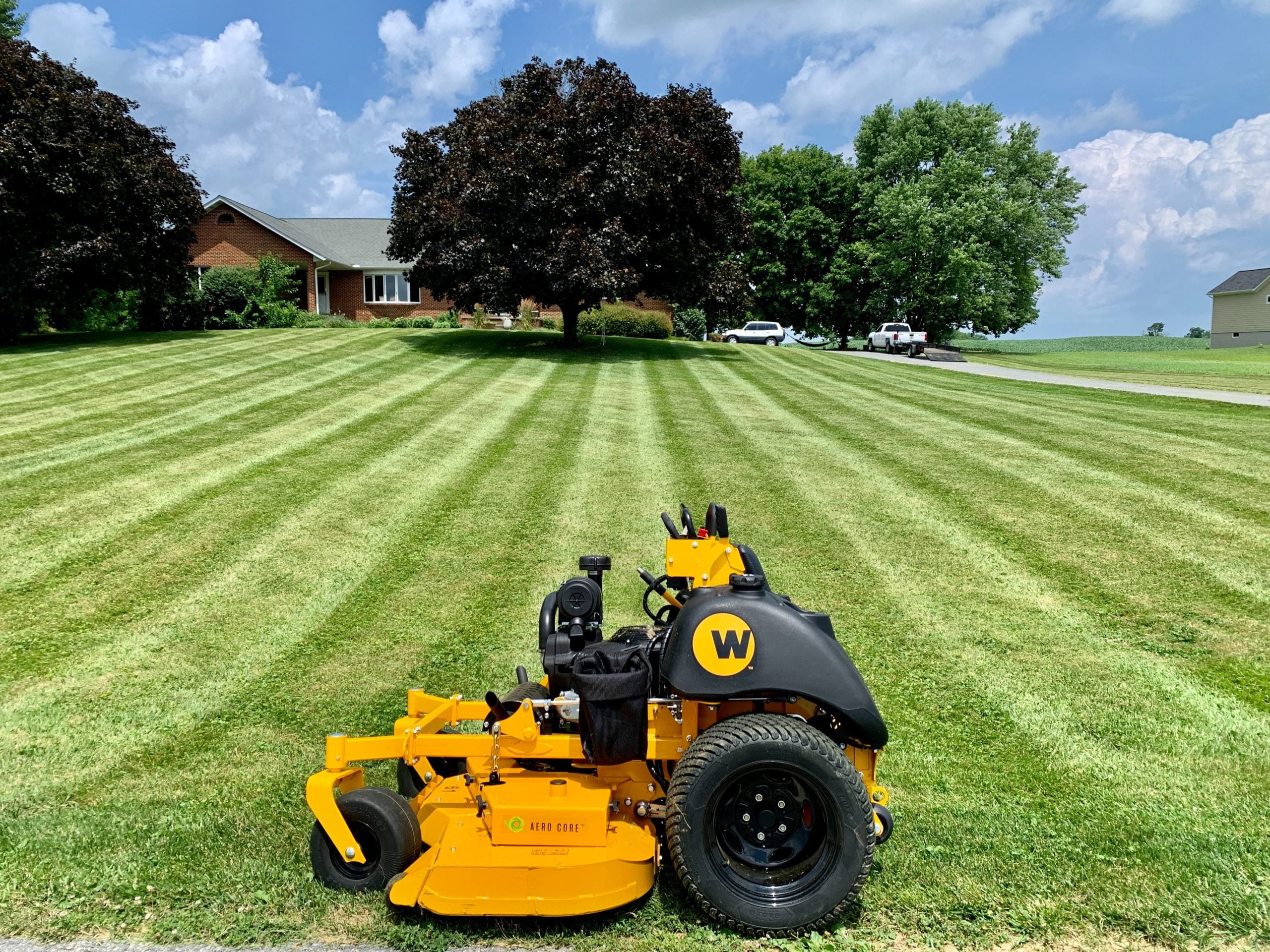 Load video: COX Commercial Mowers Stander® ZK photo of mower on freshly mowed lawn